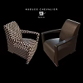 Modern Leather Leisure Chairs With Accent Table And Patterned Rug In Living Space