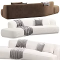 White and Brown Upholstered Double Sofa with Striped Throw Blanket and Gray Pillows