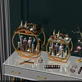 Two Circular Gold Green Multi Tier Racks Holding Perfume Skincare Bottles Makeup Brushes Eyeshadow Palettes