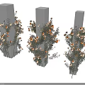 Decorative Orange And White Flowers With Green Leaves Around Gray Pillars