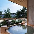 Modern Apartment Bathroom With Wooden Finish Large Window And Round Bathtub