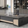 Modern Office Desk With Laptop Coffee Cup And Black Chair Near Wooden Bookshelf With Decorations