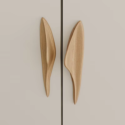 Elegant Wooden Leaf Shaped Door Handles On Light Colored Cabinet Doors 3d model