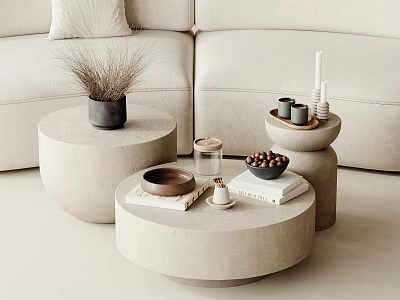 Modern Minimalist Round Concrete Coffee Table With Beige Sofa And Decorative Items 3d model