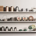 Traditional Tea Set Collection With Teapots Jars Cakes On White Shelves