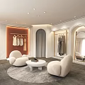 Modern Clothing Store Interior With Display Racks Sofas And Round Coffee Table