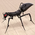 Black Mechanical Ant With Red Eyes And Long Legs On Wooden Floor