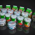 Assorted Yogurt Cups And Boxes With Colorful Fruit Flavor Packaging