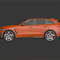 Orange Jaguar Sport SUV With Black Roof Shiny Exterior And Alloy Wheels
