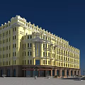 Commercial Street With Yellow Multi Story Building Featuring Ground Floor Shops And Windows