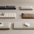 Soft Floor Cushions In Various Colors With Magazines For Interior Decor