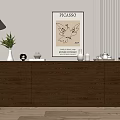 Modern Console Cabinet Sideboard with Floor Lamp Decorative Items and Picasso Poster on Light Colored Wall