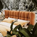 Cozy Bedroom Interior With Orange Tufted Headboard Bed Large Windows And Snowy Trees View