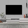 Modern White TV Stand With Large TV Decorative Figurines Green Plant And Hanging Lamps
