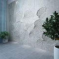 Indoor Interior Featuring Leaf Patterned Relief Wall Potted Plants Blue Curtains And Gray Tiled Floor