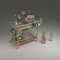 Golden Bar Cart With Champagne Bottles Wine Glasses Ice Bucket And Floral Decorations