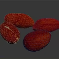 Four Ripe Red Fruits with Textured Surfaces on Dark Background