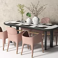 Modern Dining Table Set with Oval Marble Tabletop Pink Chairs Vase Branches and Green Plant