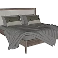 Modern Double Bed with Wooden Headboard Neutral Tones Pillows and Fringe Blanket