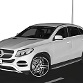 Silver Mercedes Coupe SUV Parked On Road With Scenic Mountain View