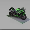 Green Sport Motorcycle With Black Accents On Display Mat Gray Background