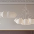 Modern Fabric Cloud And Glass Sphere Chandeliers In Interior Design