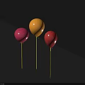 Colorful Decorative Balloons In Red And Orange With Yellow Strings On Dark Background
