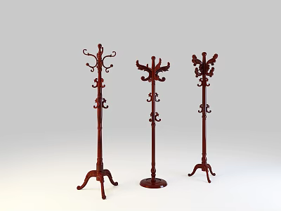 Classic Carved Wooden Coat Racks With Decorative Designs And Sturdy Bases 3d model