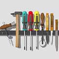 Assorted Hardware Tools Hanging On Rack Including Hammer Screwdrivers Wooden Brush Bottle Opener And Knives