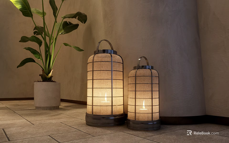 Two Lit Decorative Lanterns With Metal Frame Linen Shade And Green Plant On Stone Floor 3d model 