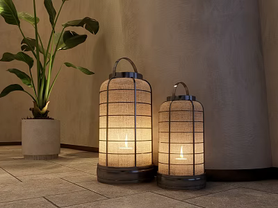 Two Lit Decorative Lanterns With Metal Frame Linen Shade And Green Plant On Stone Floor 3d model