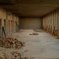 Abandoned Industrial Factory Interior With Weathered Walls Debris On Floor And Windows Along Sides