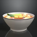 Delicious Red Broth Soup in White Bowl with Tofu Meatballs and Green Vegetables