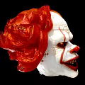 Scary Clown Mask With Red Hair White Face Red Stripes And Yellow Teeth