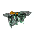 Oval Shaped Green Marble Coffee Table With Bowl Of Oranges And Magazine