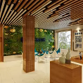 Modern Office Interior With Wooden Reception Desk Green Plant Wall Digital Screen And Chairs