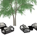 Outdoor Sofa with Wicker Black Frame Light Cushions and Coffee Table Under Large Tree