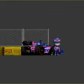 Blue And Pink Racing Car With Pit Figure Near Track Side Tire Wall