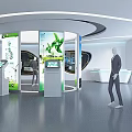 Modern Exhibition Hall Front Reception Desk With Information Screens Green Plant Elements And Circular Design