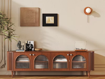 Wooden Brown TV Stand with Glass Doors Decorations and Potted Plant by Light Colored Wall 3d model