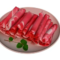 Fresh Sliced Lamb Meat Rolls on Pink Plate with Green Leaves Garnish