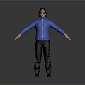 Man in Blue Jacket Black Cap and Black Pants with Arms Outstretched Against Gray Background