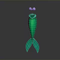 Green Mermaid Tail Decorative Ornament With Purple Bow Standing On Dark Background