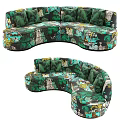 Stylish Curved Sectional Sofa With Colorful Jungle Print And Green Accent Cushions