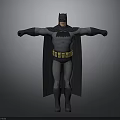 Man in Batman Costume Posing with Arms Outstretched Against Gray Background