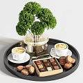 Latte Coffees With Latte Art Chocolate Box And Cookies On Black Tray With Green Plant