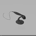 Black Telephone Handset With Curved Cord On Stable Base For Daily Use