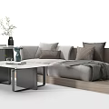 Elegant Modern Two Seater Sofa with Gray Pillows and Blanket Near Marble Coffee Table with Vase
