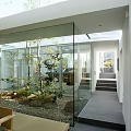 Modern Indoor Outdoor Garden Landscape with Glass Wall Trees Greenery And Wooden Seats