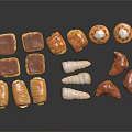 Assorted Pastries With Various Shapes And Colors Arranged On Black Surface